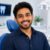 Smiling dental patient after professional dental cleaning at a modern dental clinic.